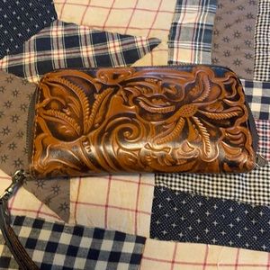 Dark brown wallet credit card area checkbook area